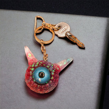 Monster Eye red and blue keychain. Model Pointy.