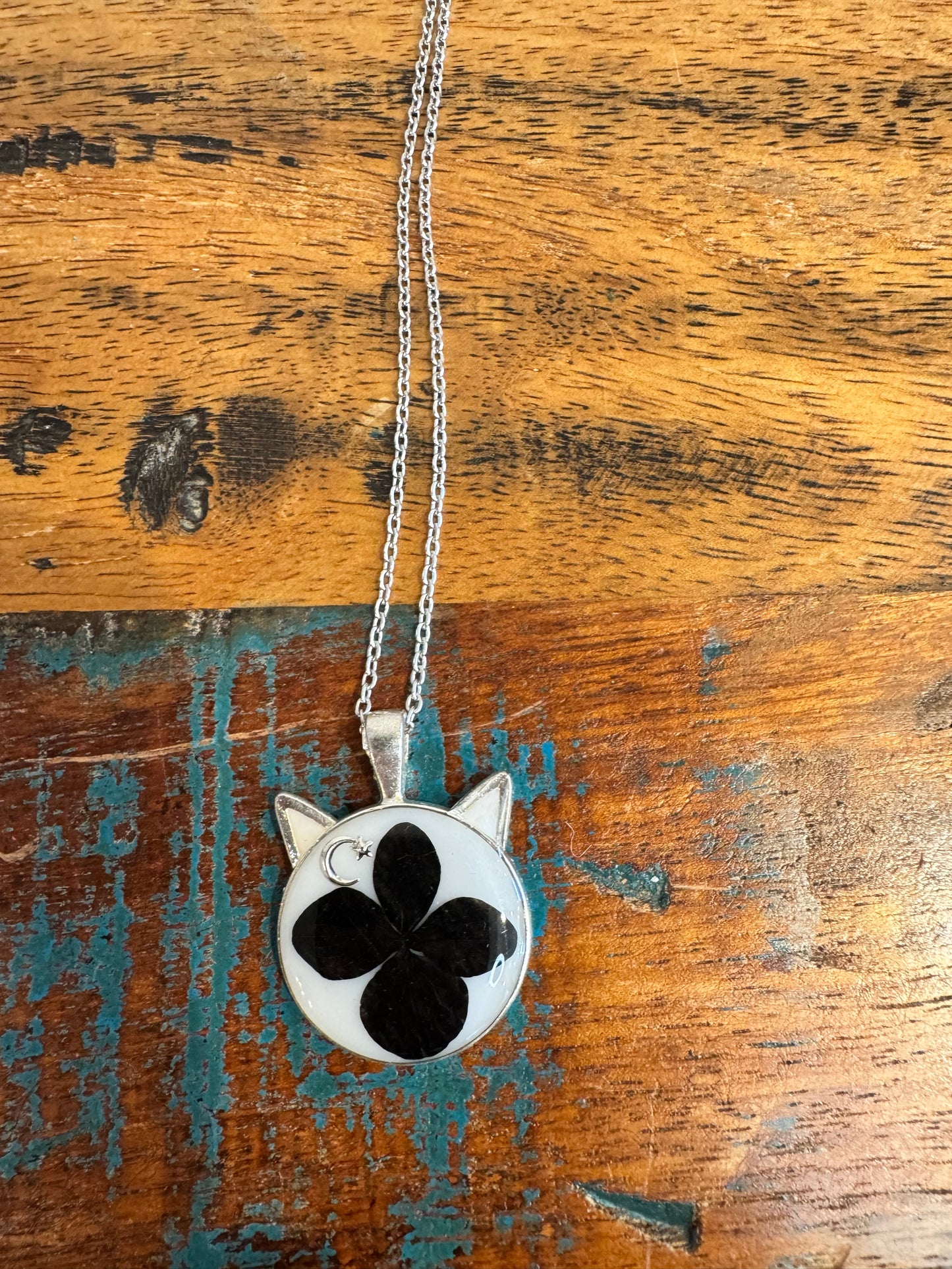 Cat head necklace with black flower and moon