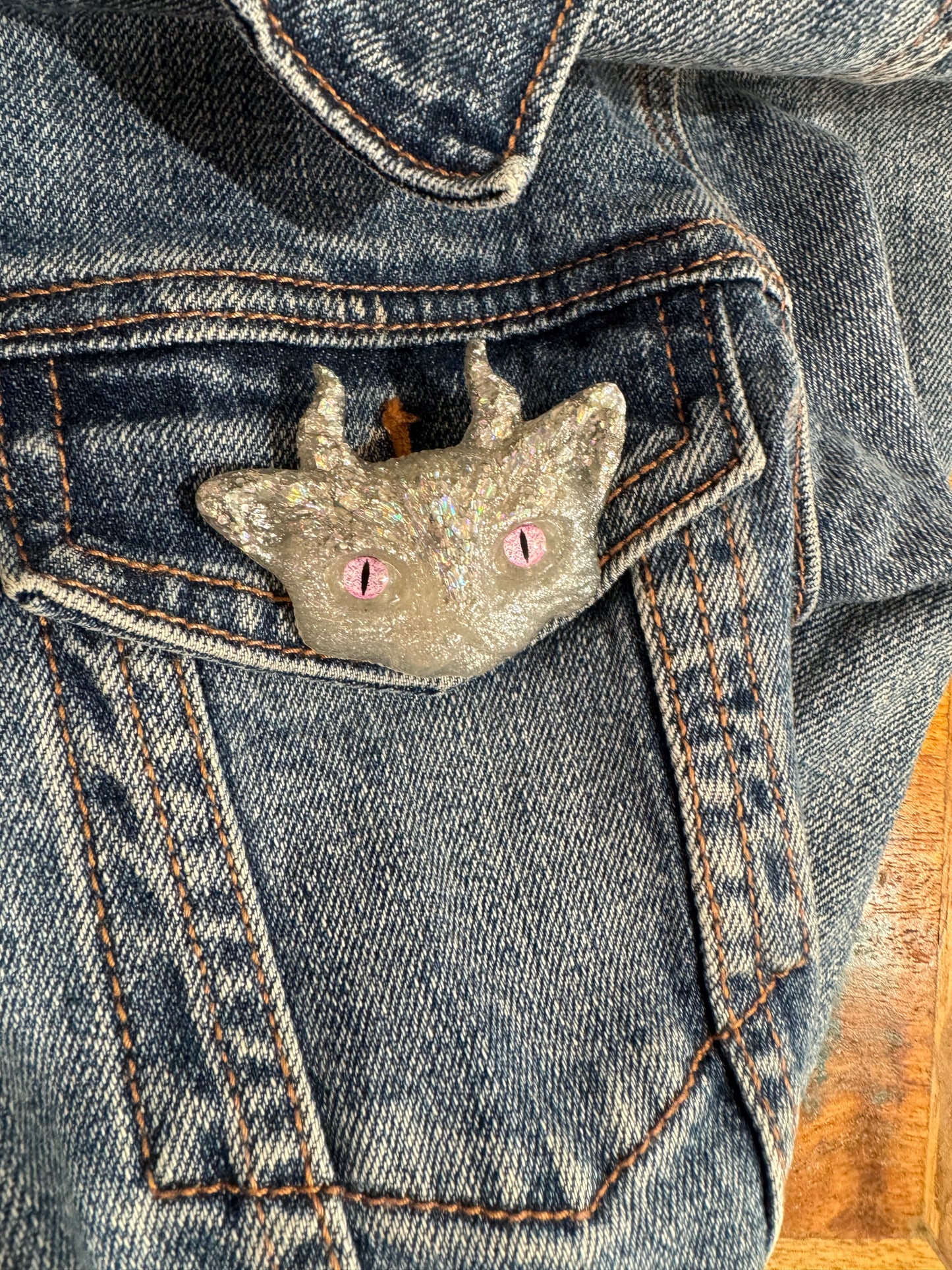 White and silver cat brooch with horns