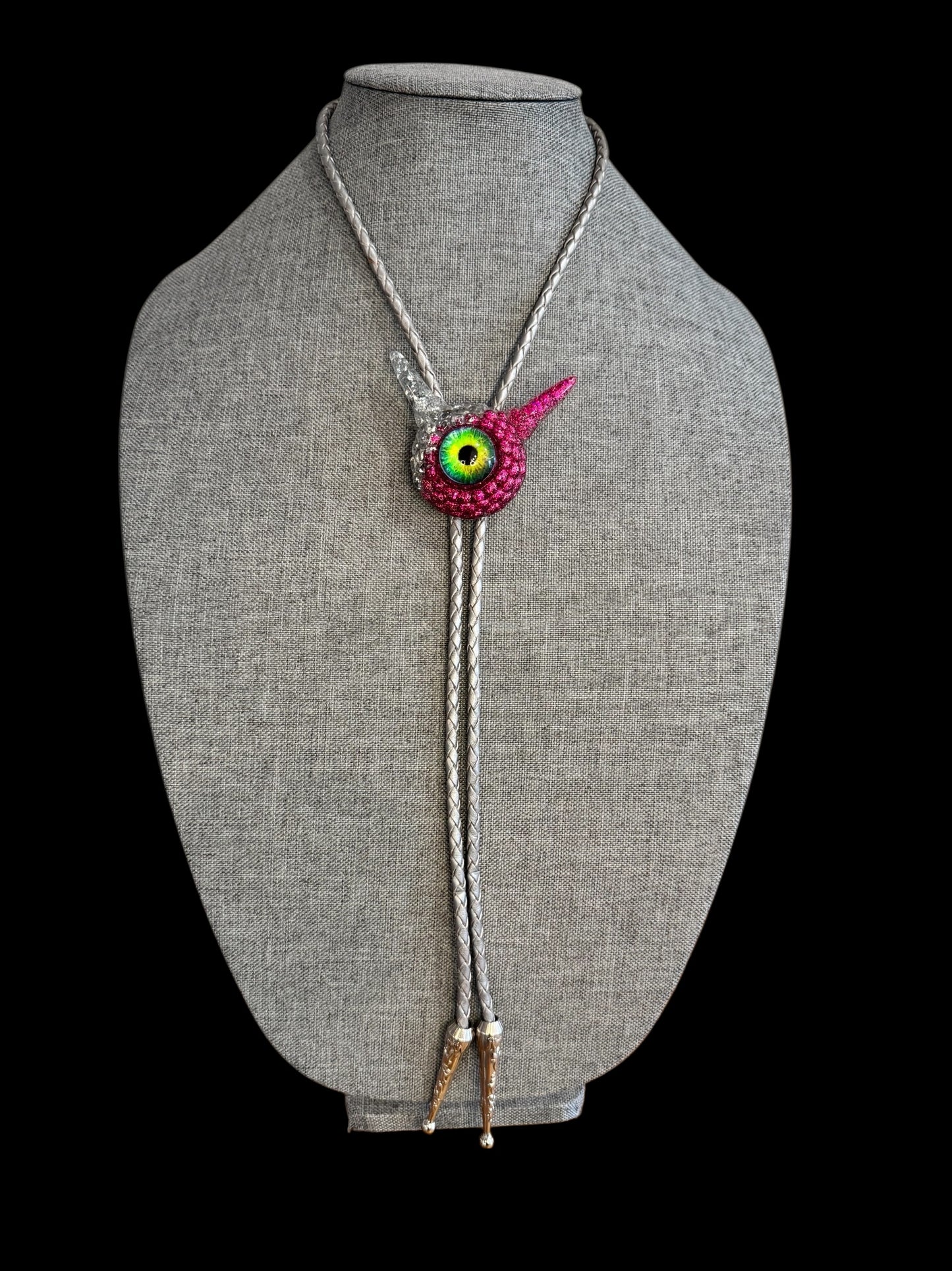 Monster bolo tie in silver and pink. Model Pointy.