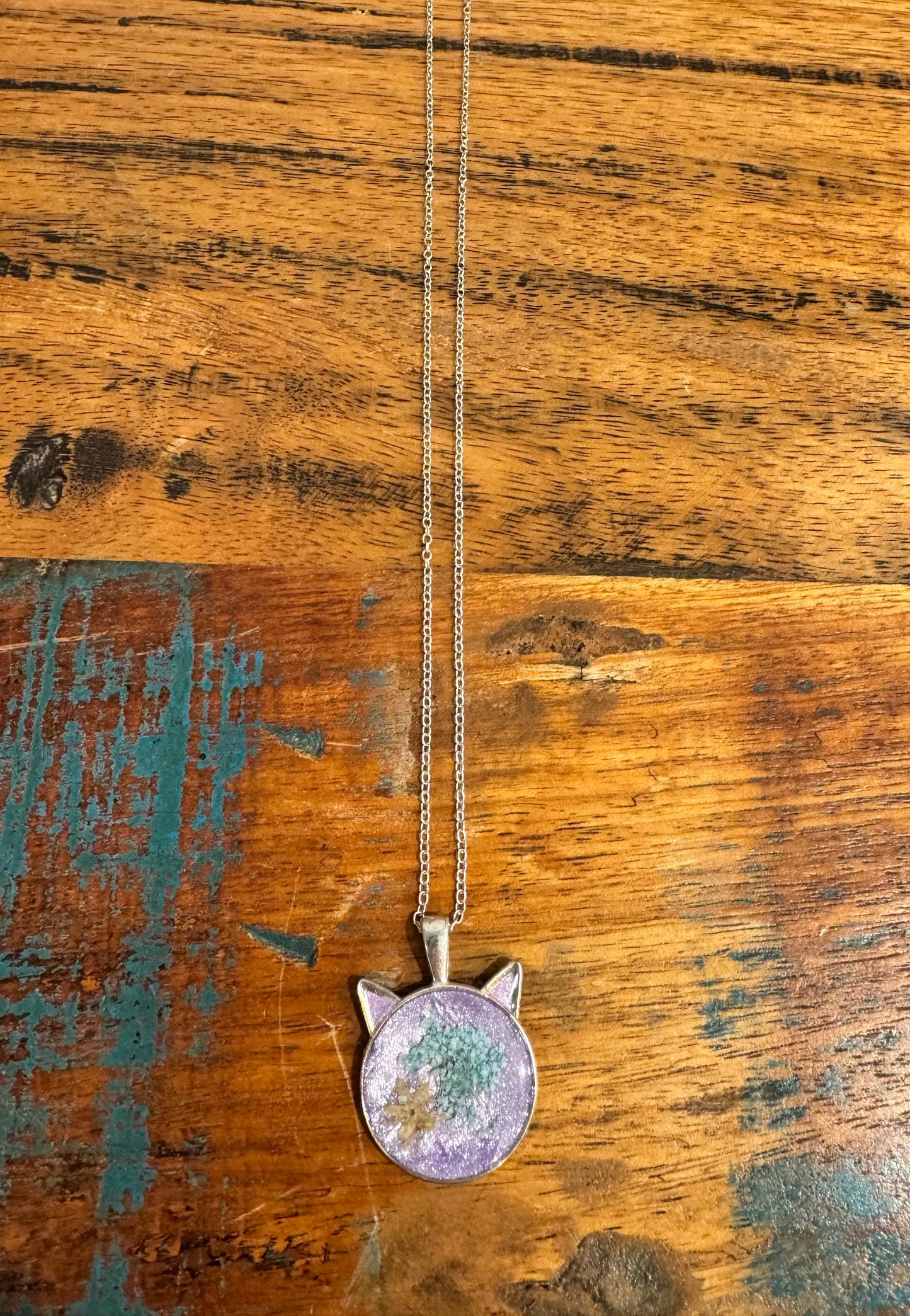 Cat head necklace, purple with blue and yellow flowers