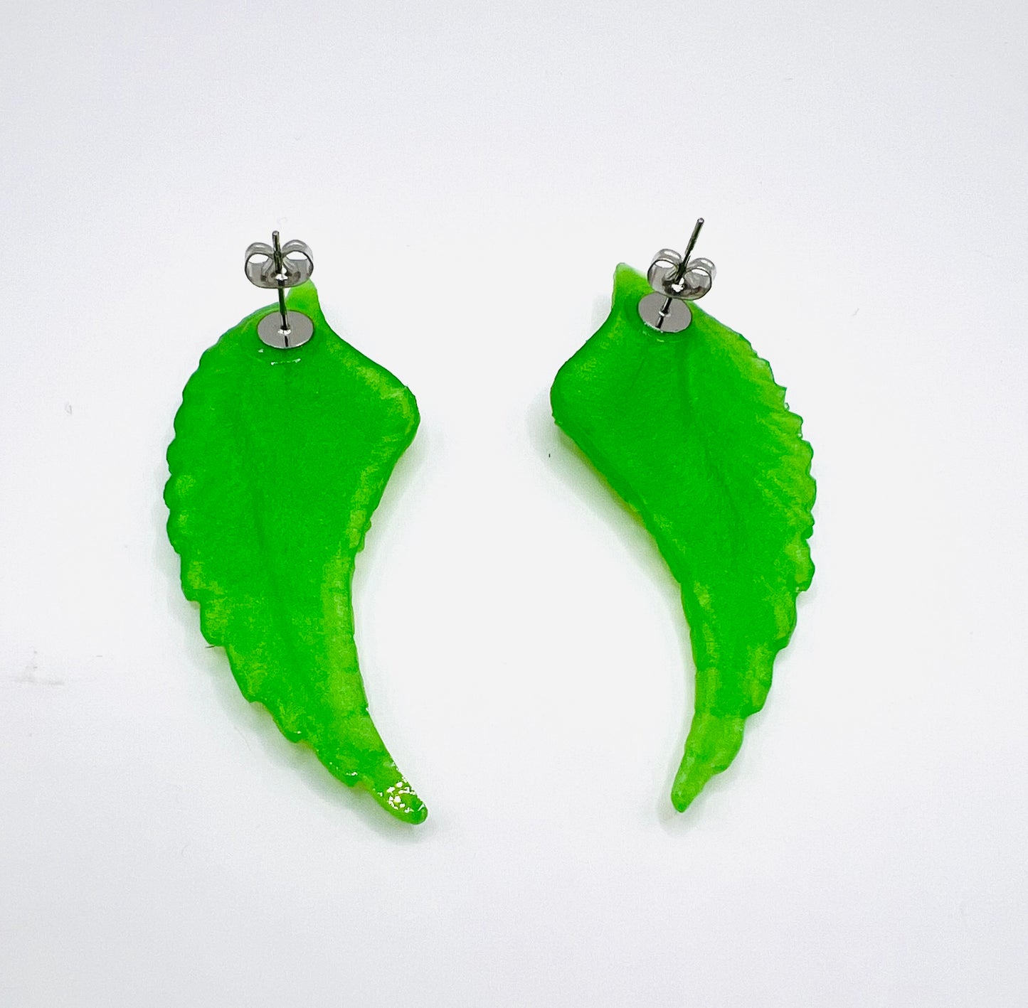 Angel wings earrings, Green apple colored fantasy earrings.