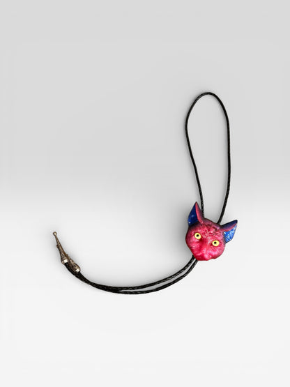 Cat bolo tie in pink and blue.