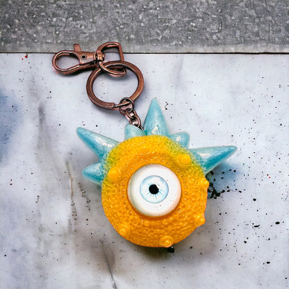 Monster blue and yellow keychain. Model Spiky.