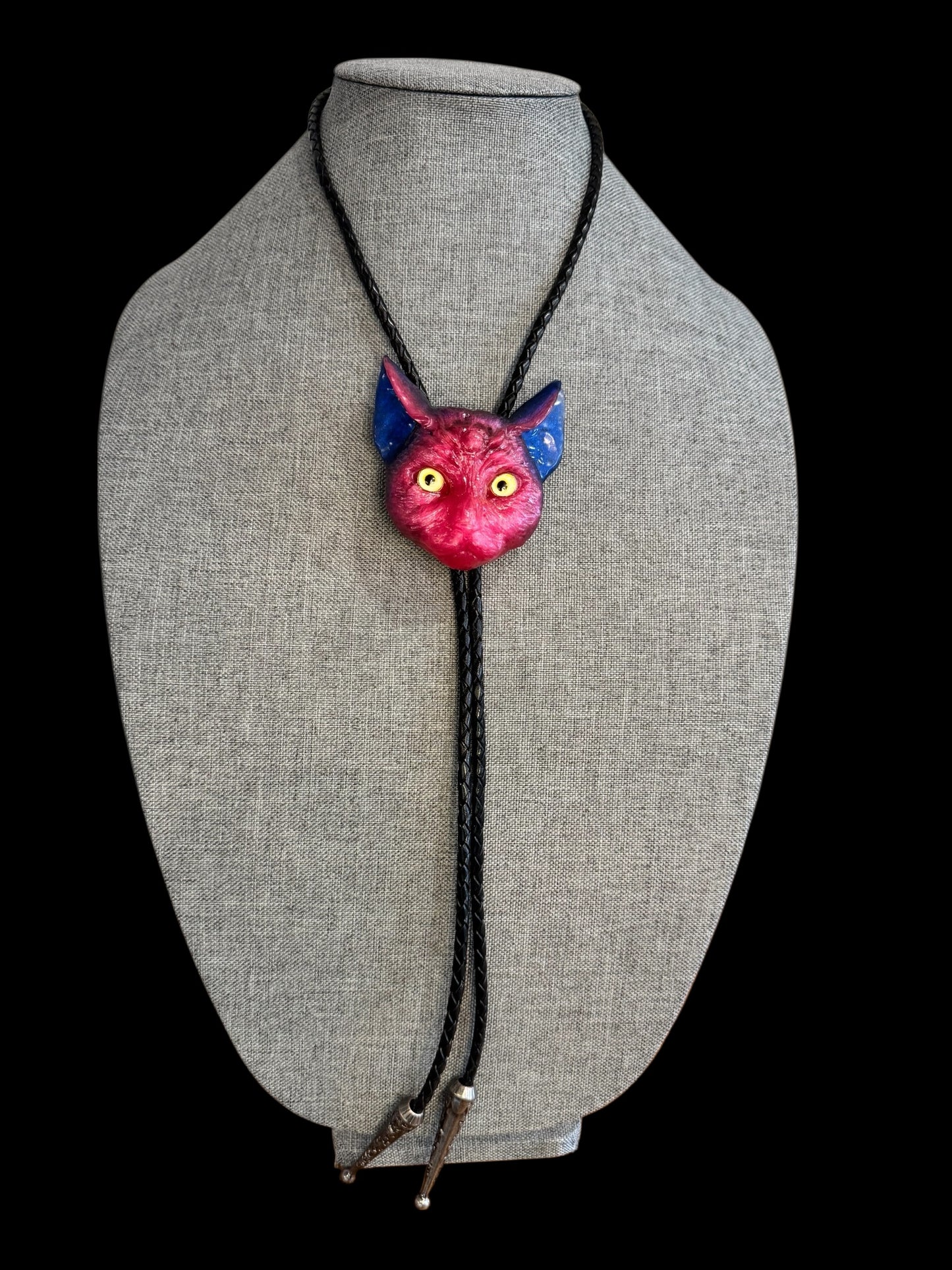Cat bolo tie in pink and blue.
