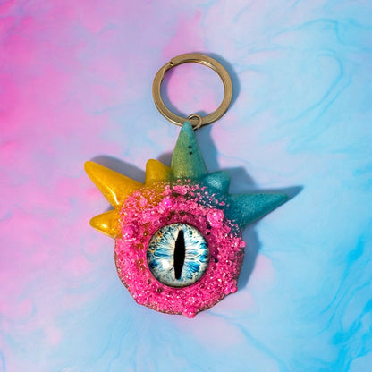 Monster keychain, pink,blue and yellow. Model Spiky.