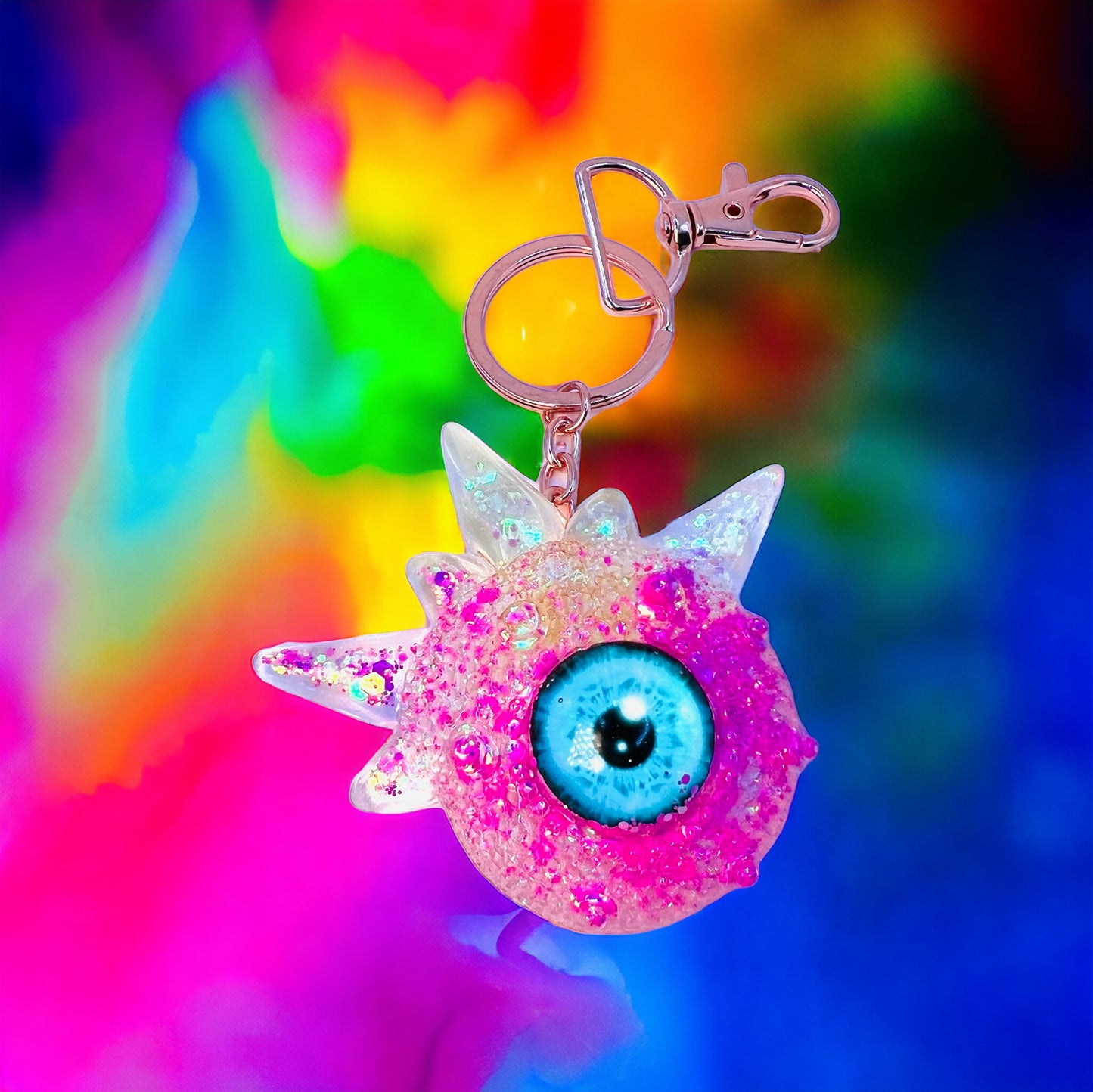 Pink glitter monster keychain. Model Spiky.