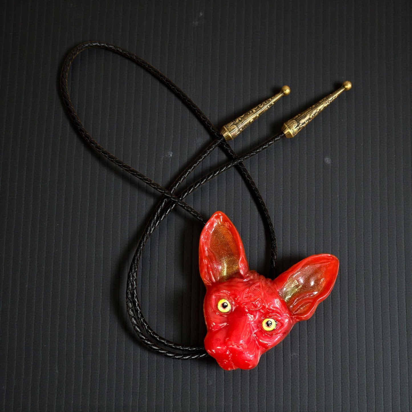 Cat bolo tie in red.