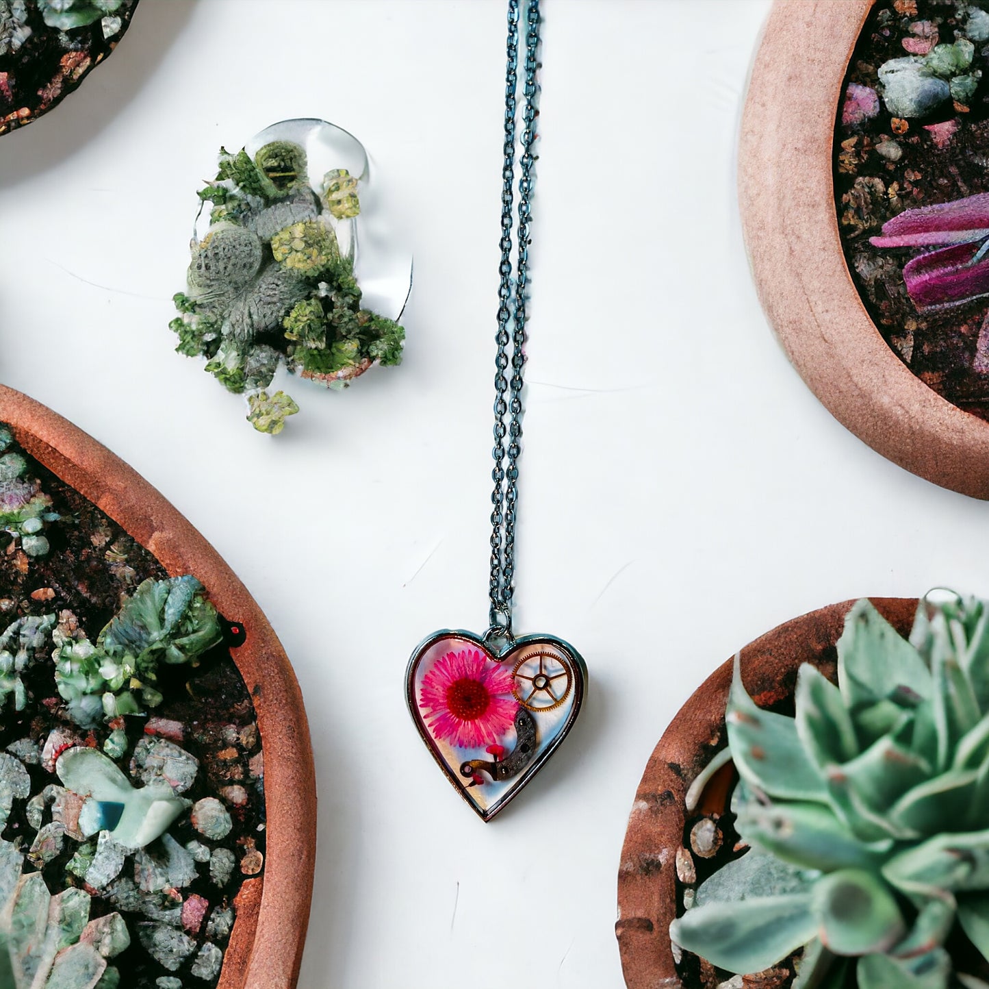 Heart necklace with pink chrysanthemum and watch parts