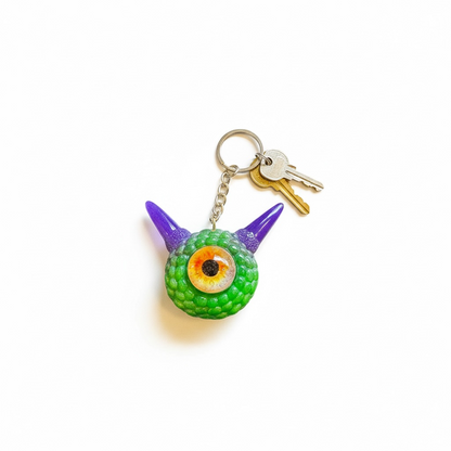 Monster green and purple keychain. Model Pointy.