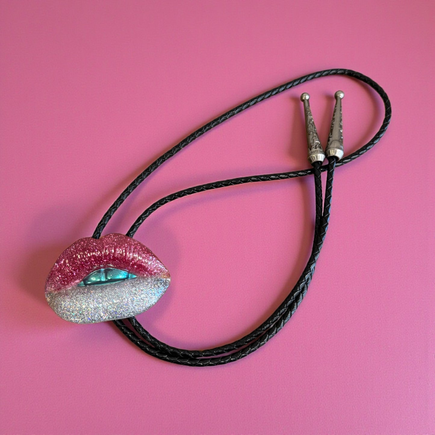 Bolo tie, silver and pink lips with blue teeth