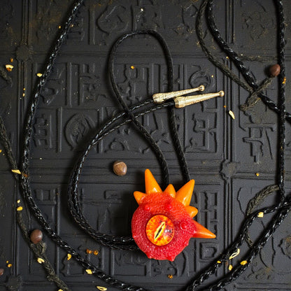 Monster bolo tie in red and orange. Model Spiky.