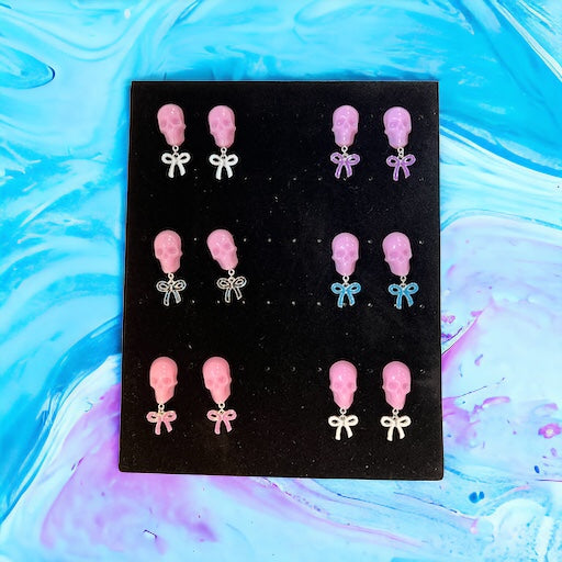 Bubblegum Skull with purple bow and silver metal earrings studs