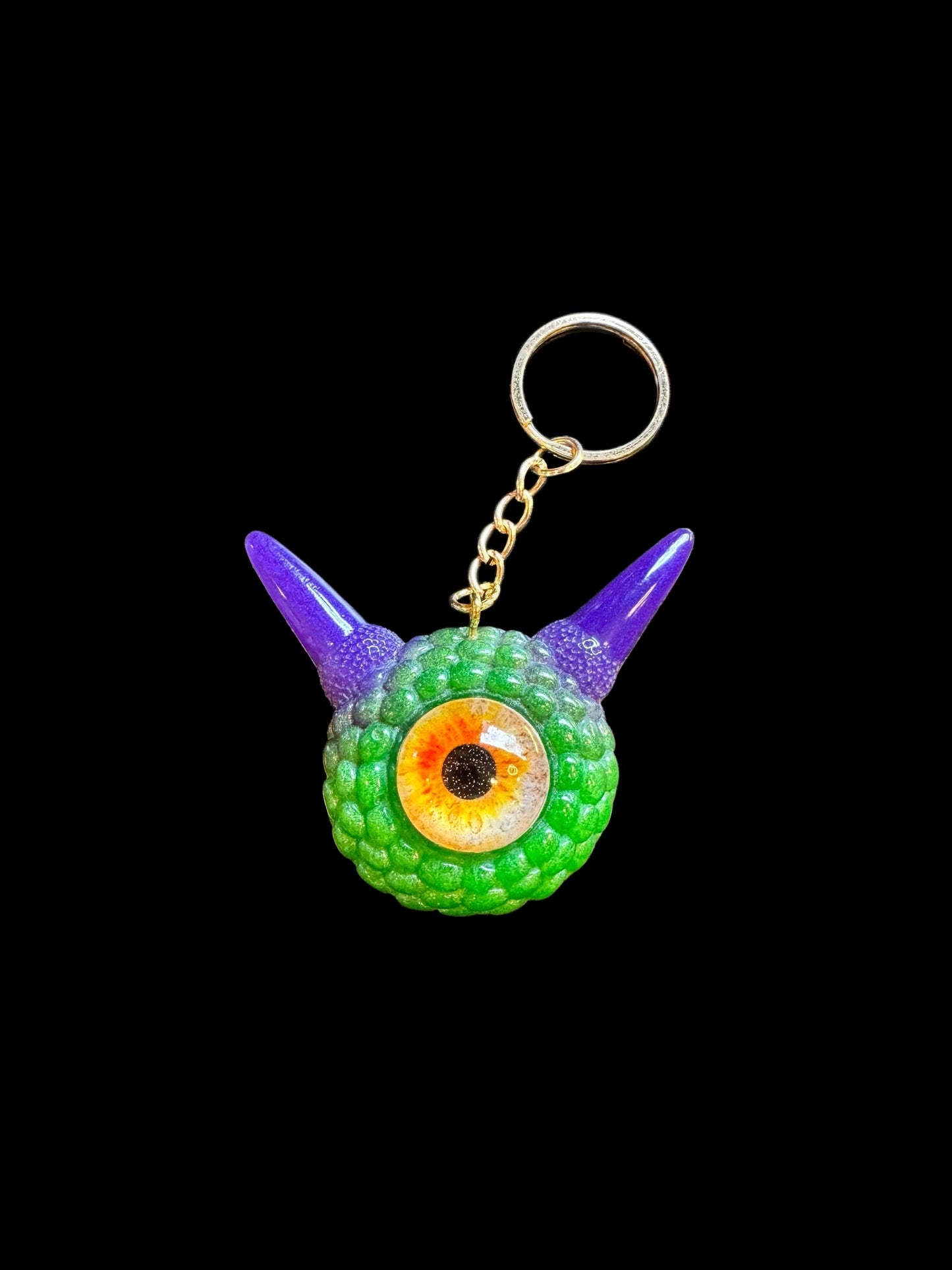 Monster green and purple keychain. Model Pointy.