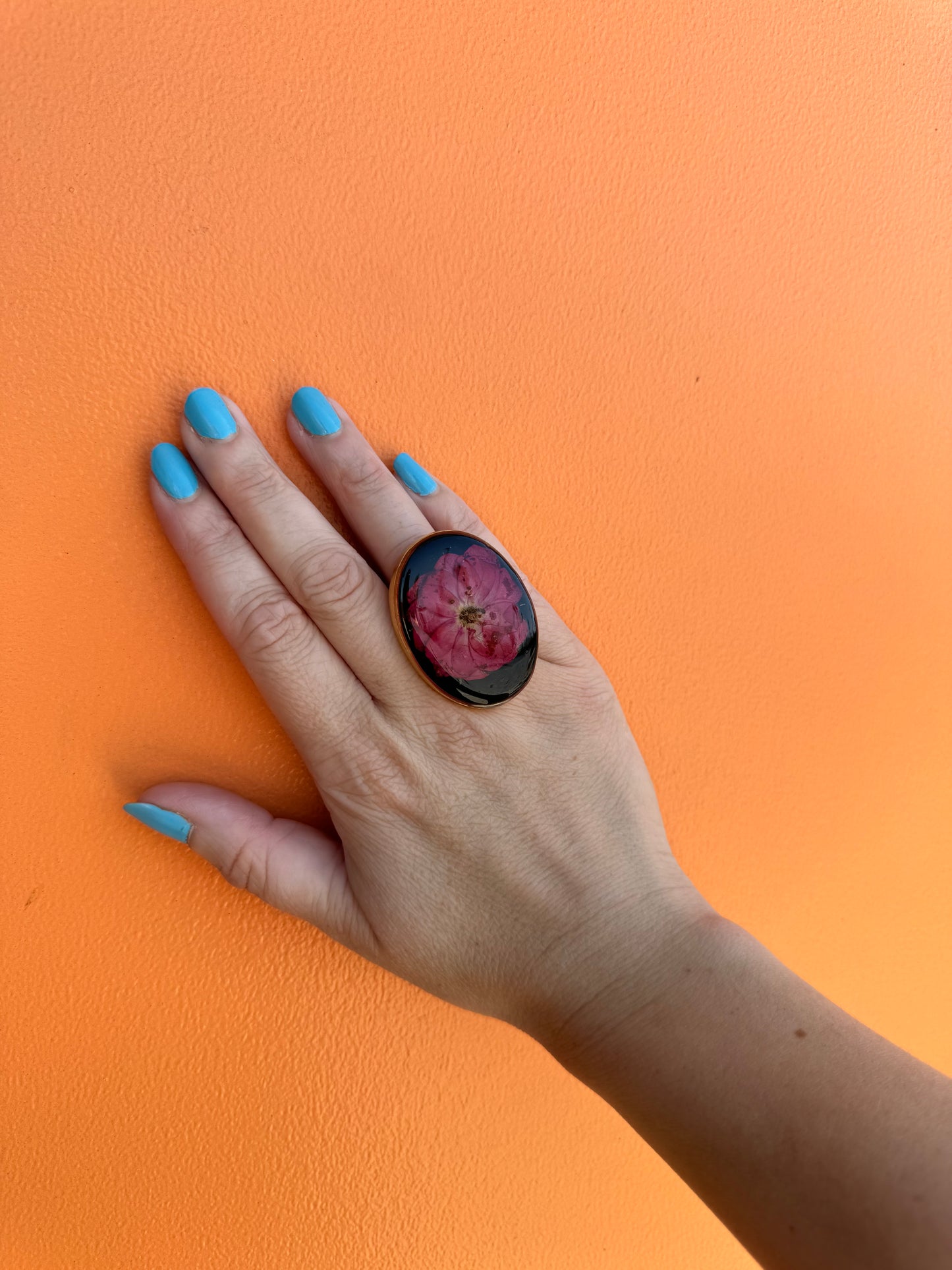 Oversized oval gold plated ring with rose