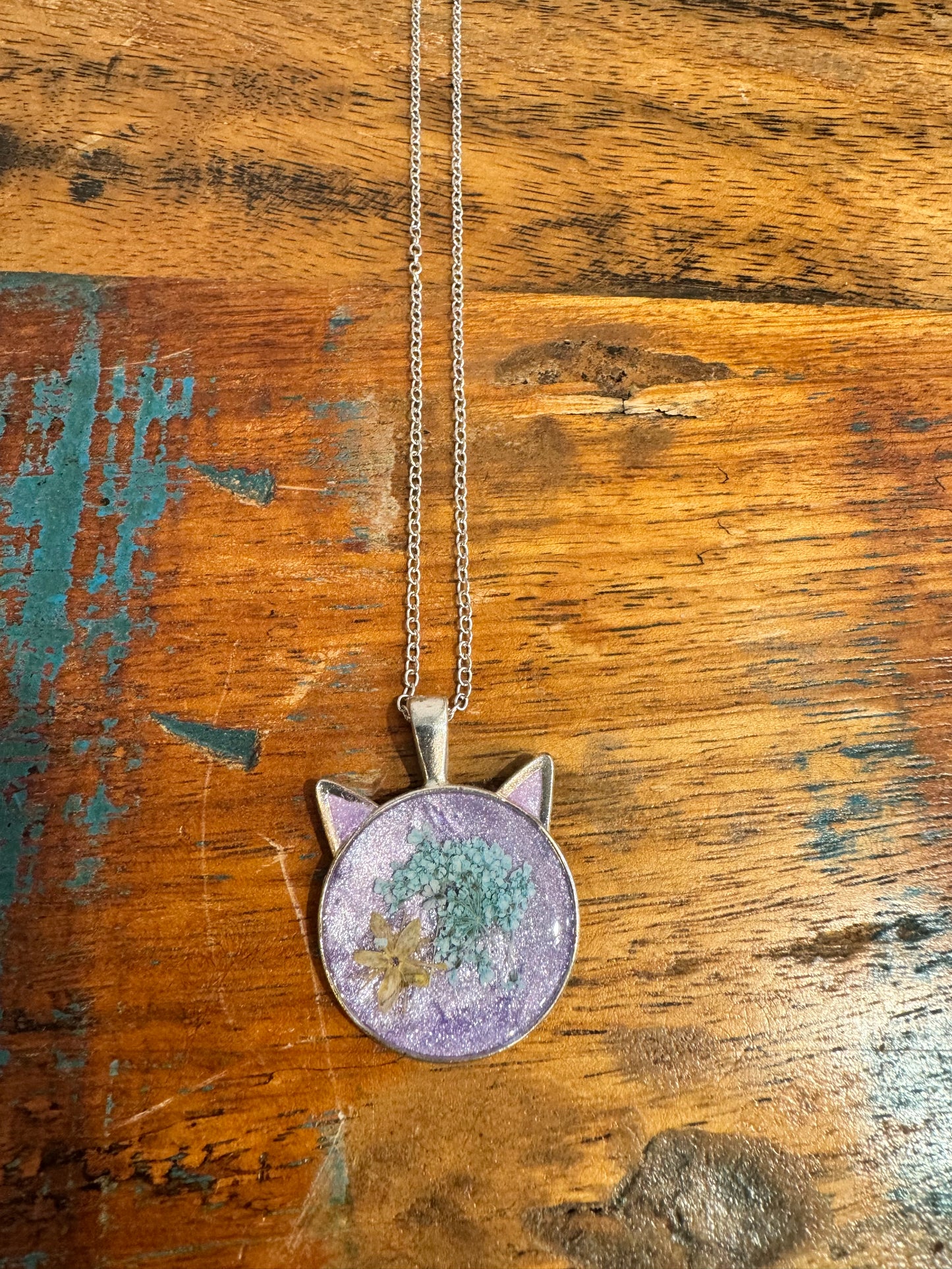 Cat head necklace, purple with blue and yellow flowers