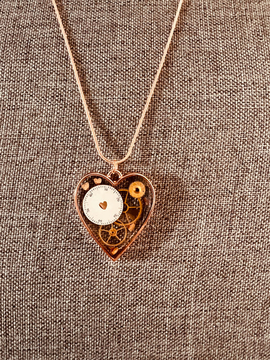 Antics watch parts necklace with hearts glitter, handmade resin jewelry, antics watch parts set in resin in a heart shape necklace, perfect Valentine’s Day gift, birthday gift for her, steampunk jewelry, romantic gift.