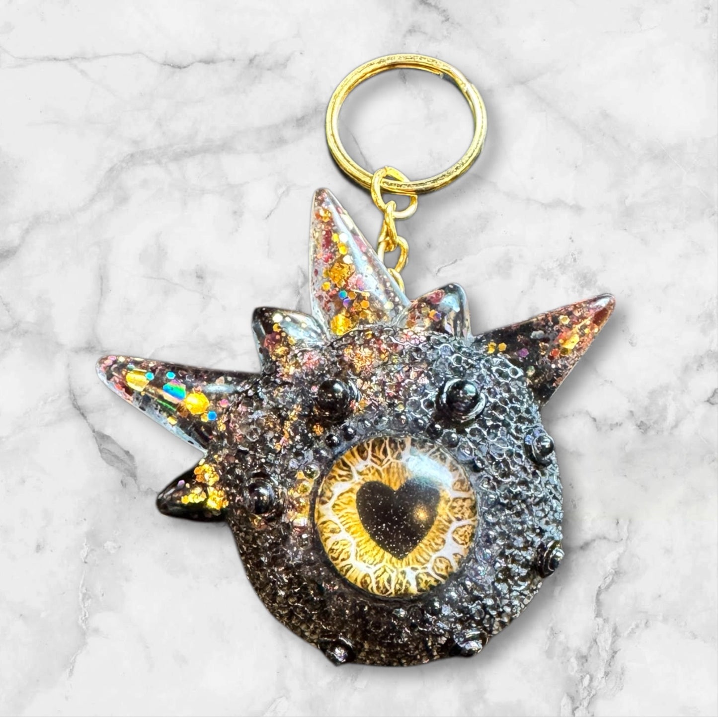 Monster black and rose gold keychain. Model Spiky.
