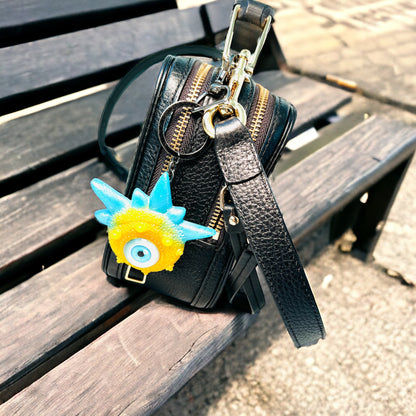 Monster blue and yellow keychain. Model Spiky.