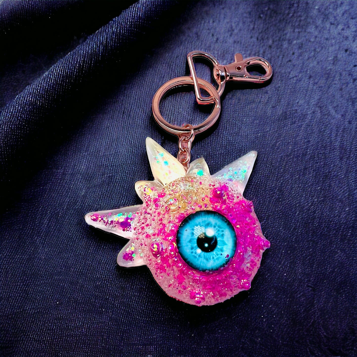 Pink glitter monster keychain. Model Spiky.