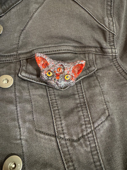 Black and red 3 eyed cat brooch