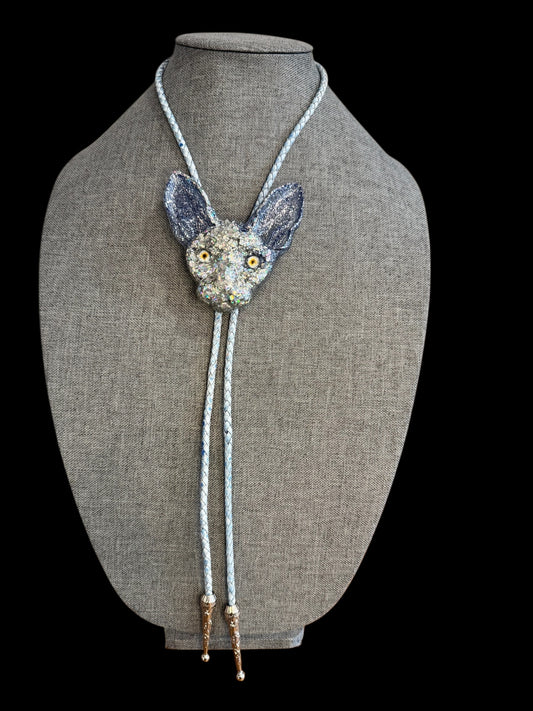 Cat bolo tie in silver and blue.