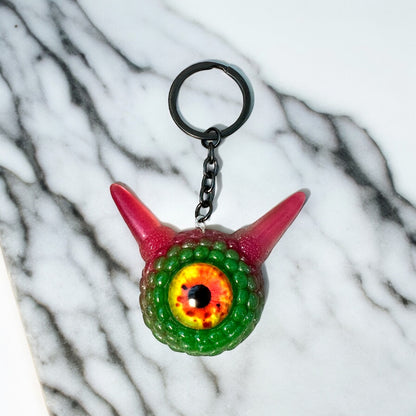 Monster green and pink kawaii keychain. Model Pointy.