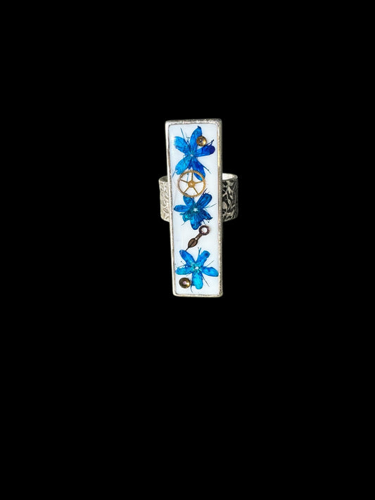 Rectangle ring with blue flowers and watch gears