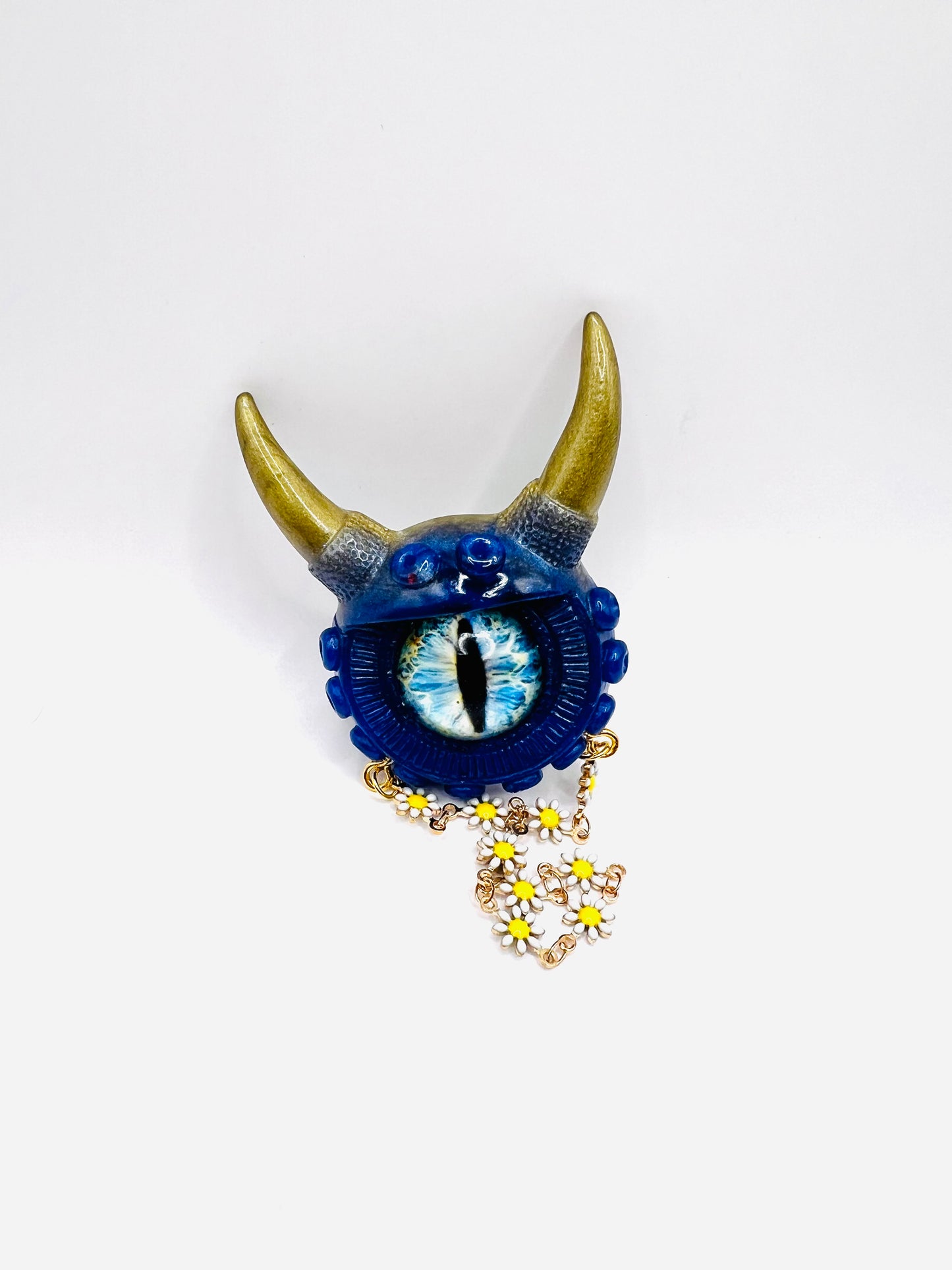 Handmade resin brooch, blue and gold monster brooch, pastel goth jewelry, evil eye brooch, weird core jewelry, kawaii brooch, unique brooch. Model Vicky.