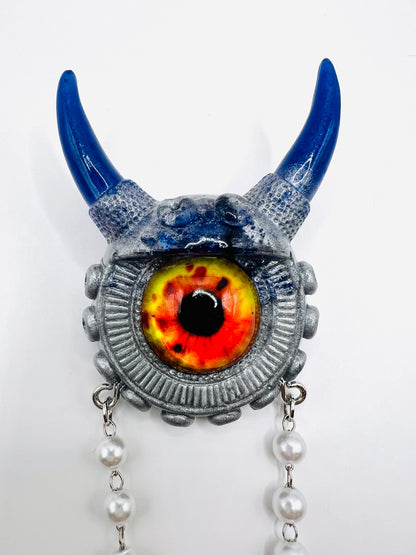 Blue and silver monster brooch. Model Vicky.