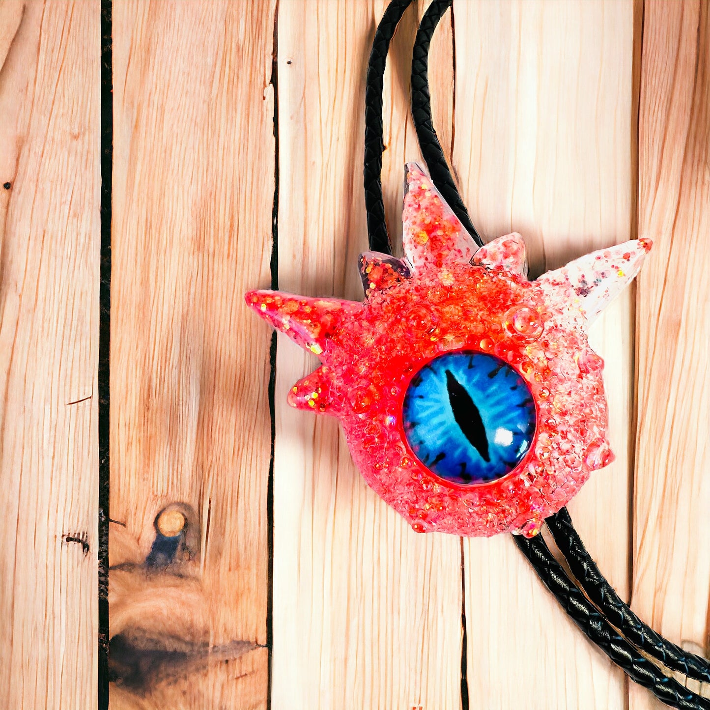 Bolo tie, unique jewelry monster bolo necktie in coral. Model Spiky.