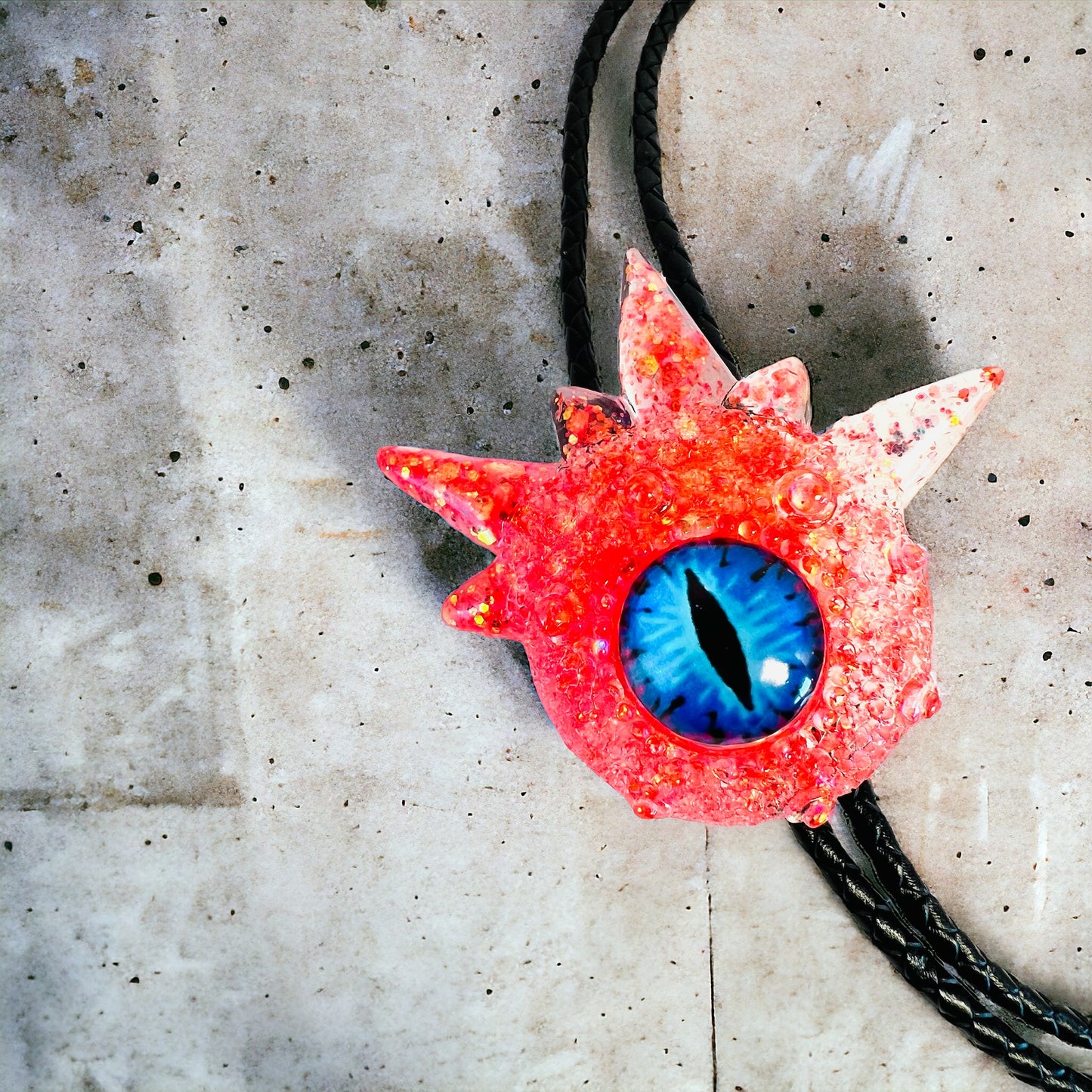 Bolo tie, unique jewelry monster bolo necktie in coral. Model Spiky.