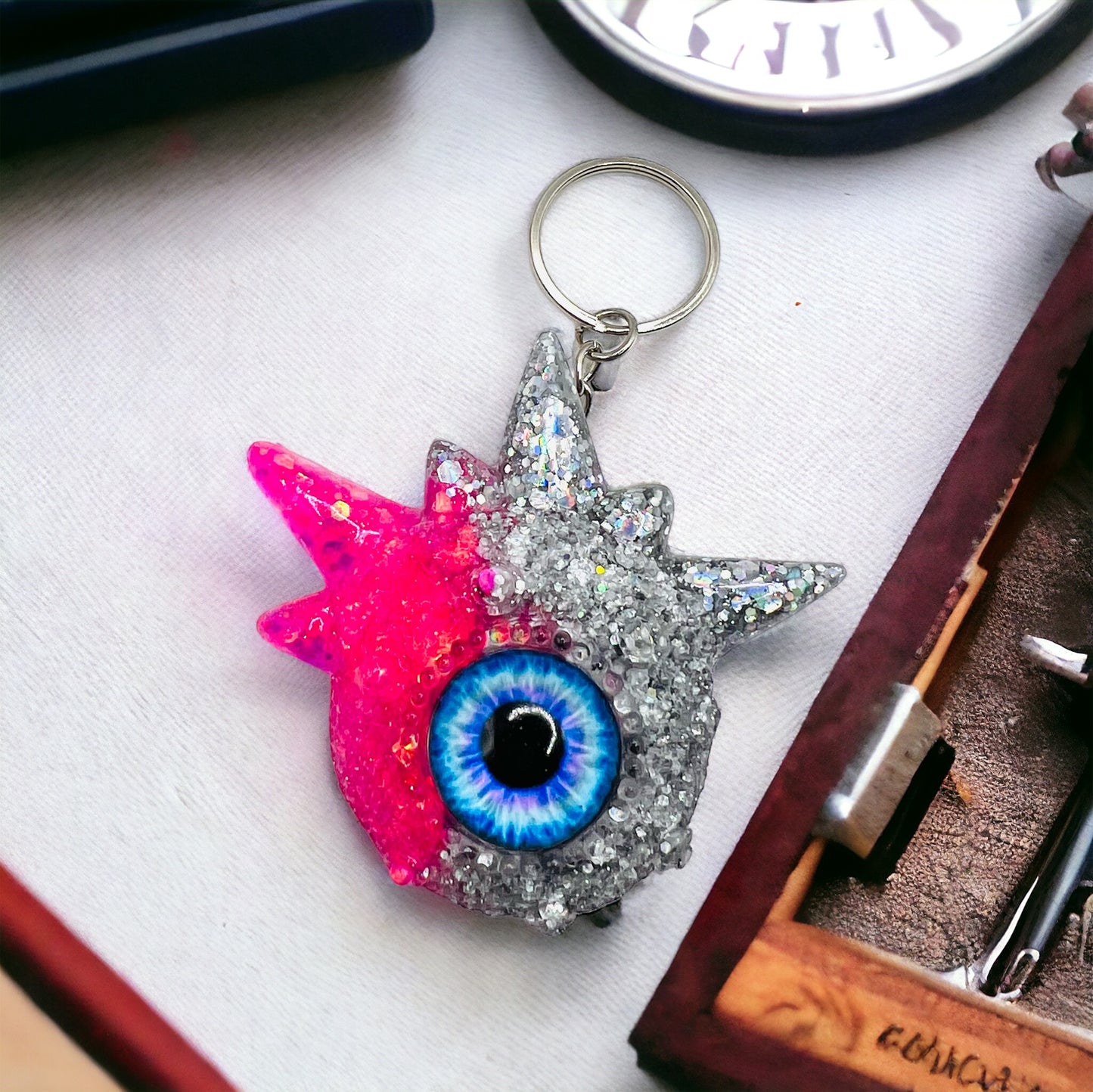 Monster pink and silver glitter keychain. Model Spiky.