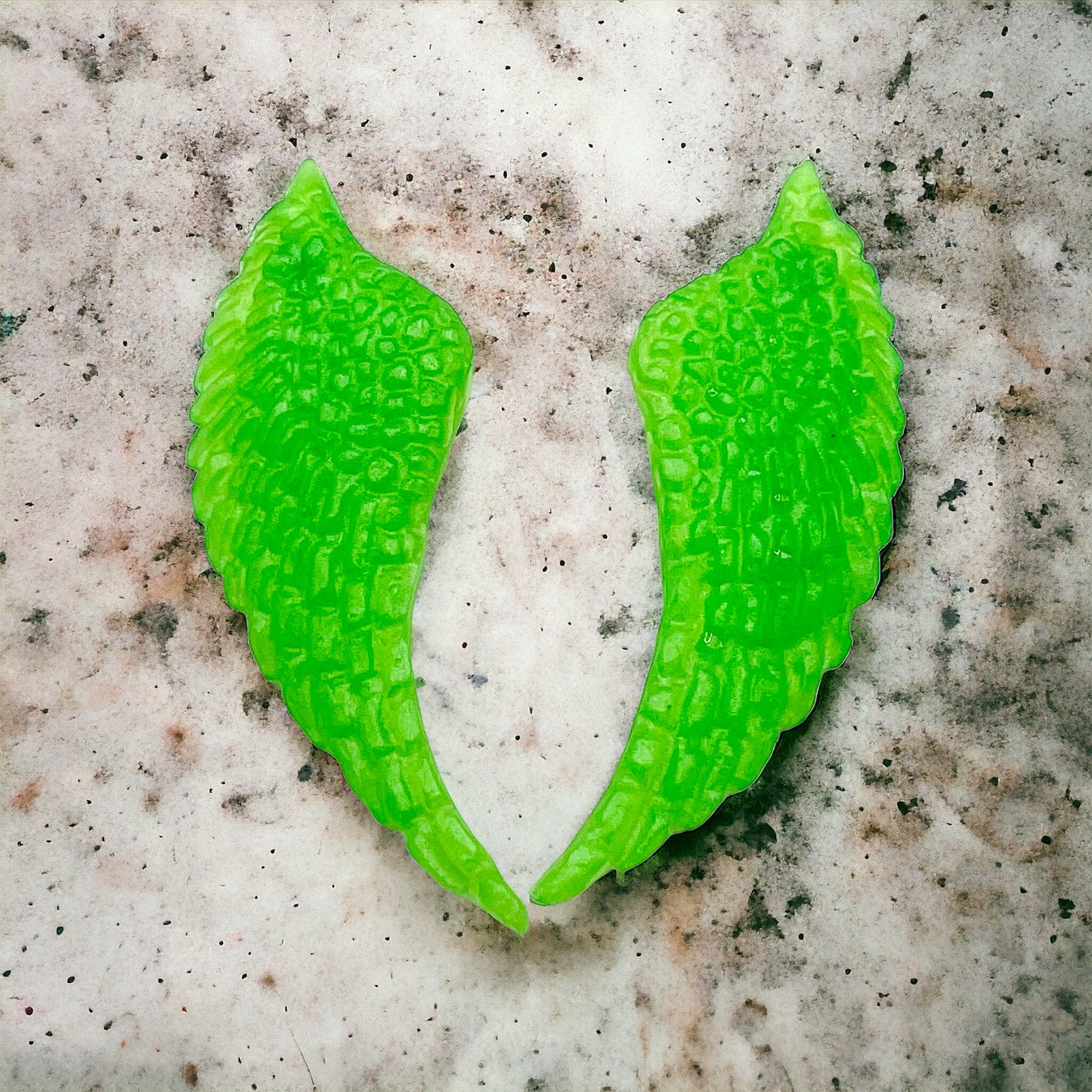 Angel wings earrings, Green apple colored fantasy earrings.