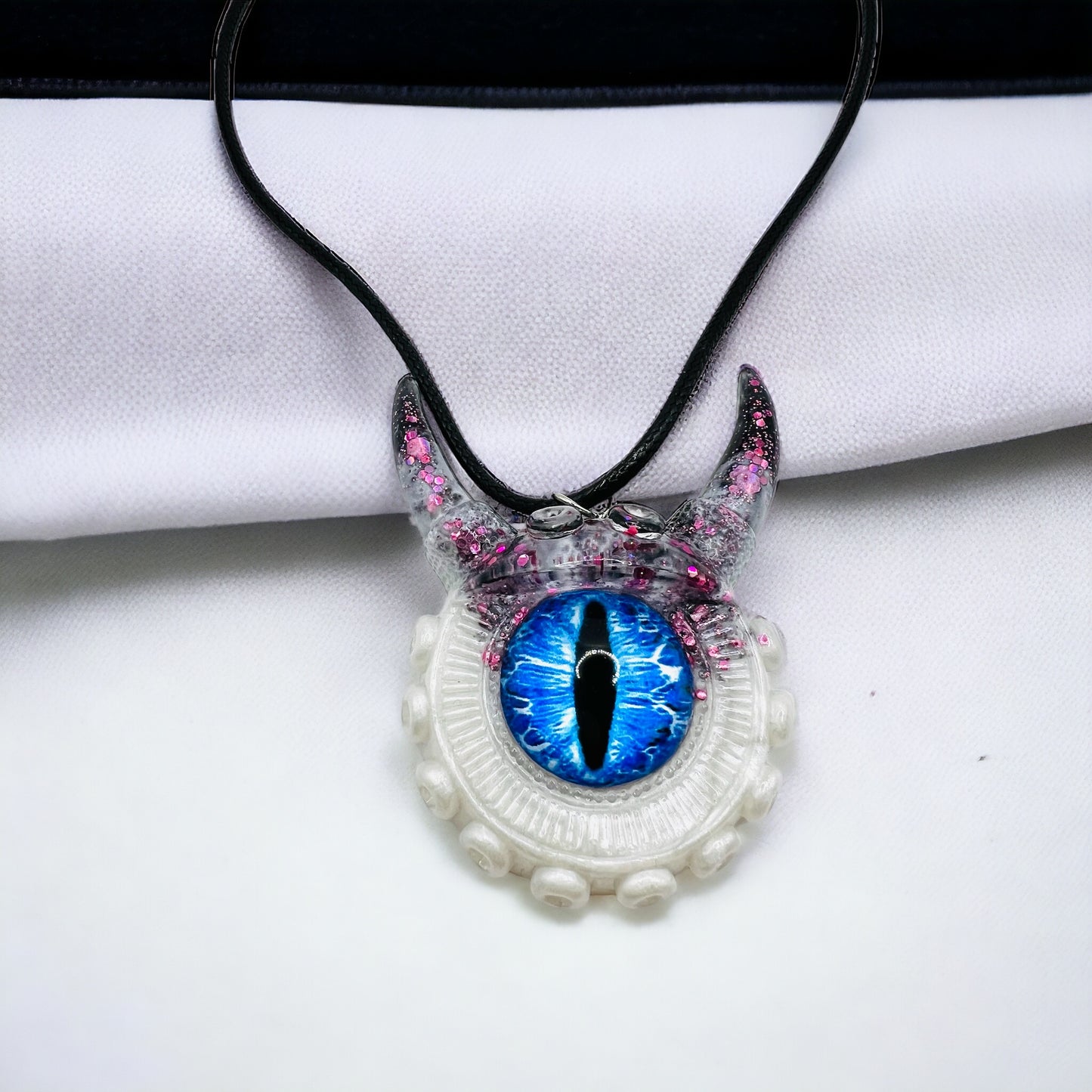 Pastel Goth necklace, monster eye necklace, evil eye handmade resin necklace, quirky pastel goth gift, spooky jewelry, kawaii gift, unique jewelry. Model Vicky.