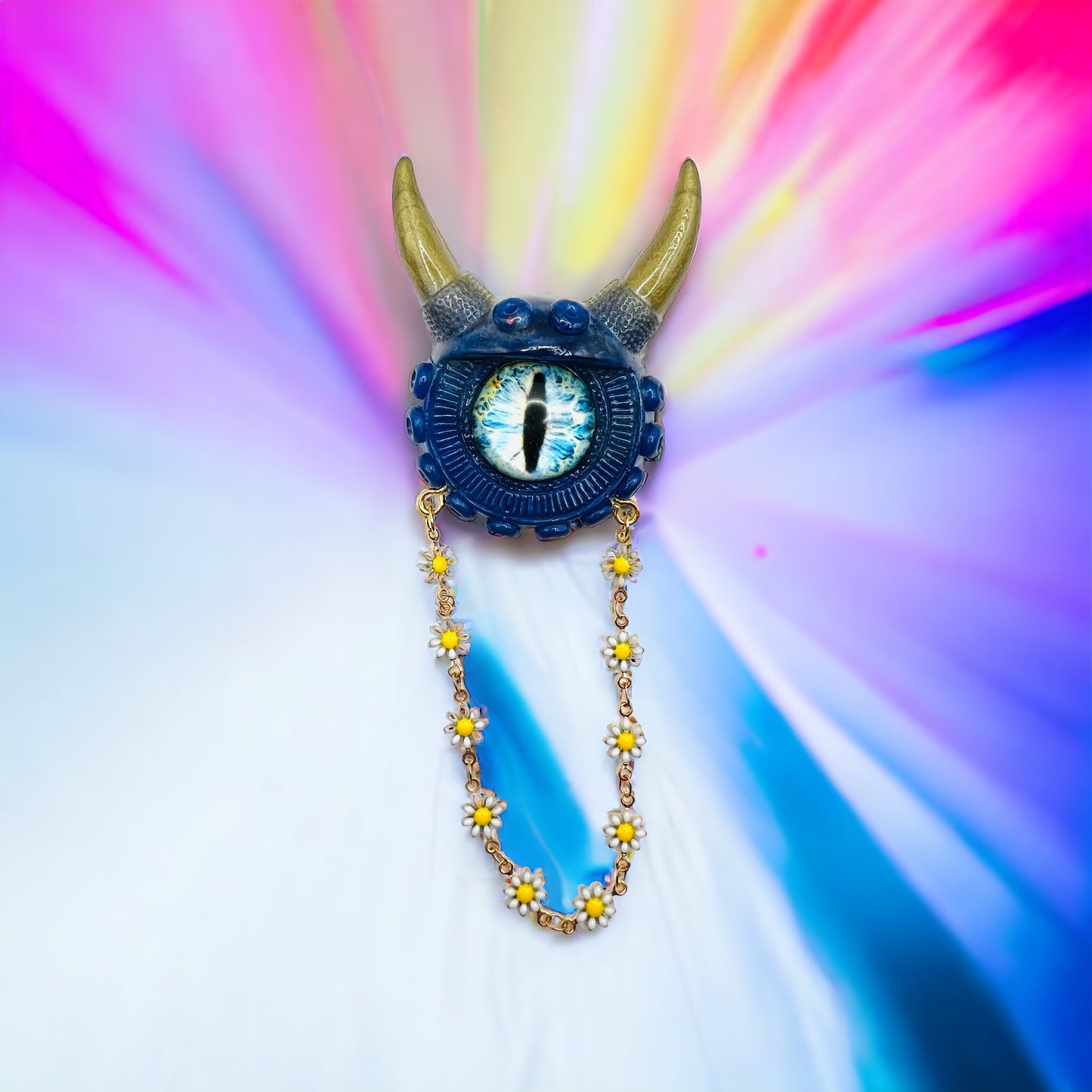 Handmade resin brooch, blue and gold monster brooch, pastel goth jewelry, evil eye brooch, weird core jewelry, kawaii brooch, unique brooch. Model Vicky.