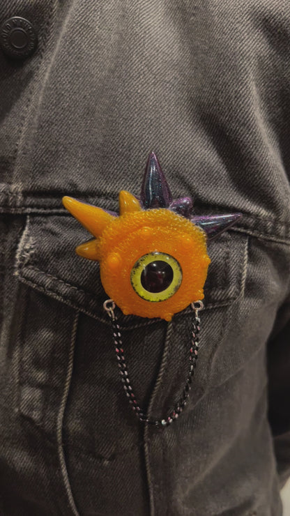 Handmade brooch, orange and black monster brooch, pastel goth jewelry, evil eye brooch in resin,creepy cute,spooky jewelry, kawaii brooch, unique brooch. Model Spiky.